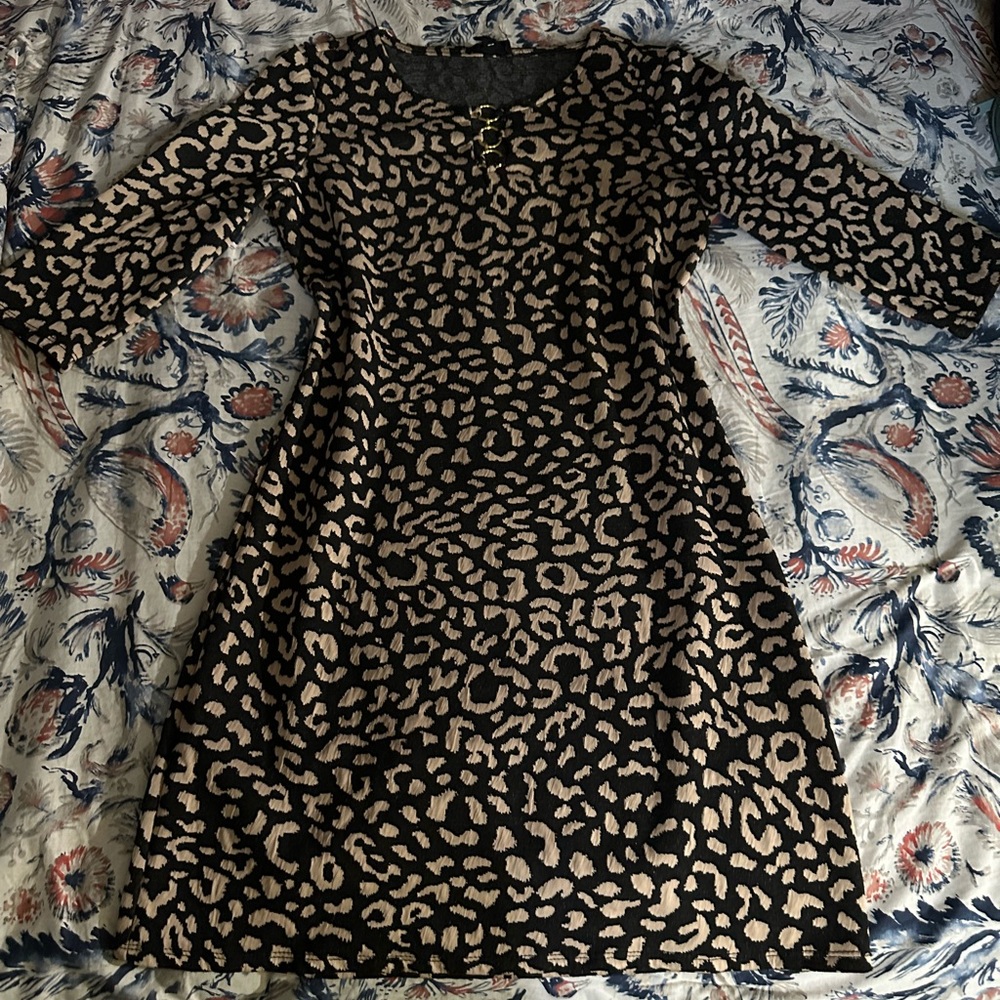 Leopard Print dress with Gold Rings enclosing the chest